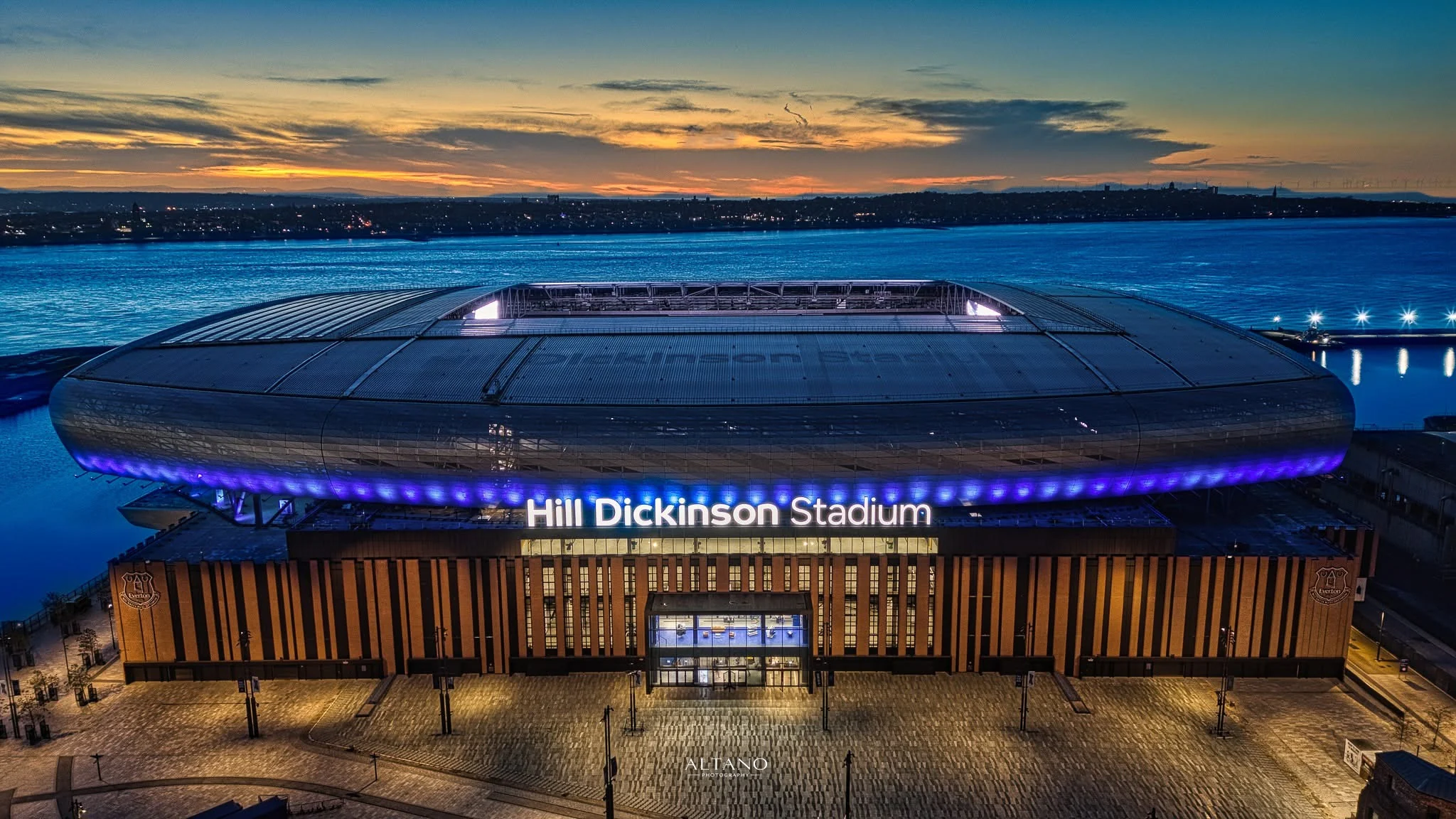 Royal Liver Building with Hill Dickinson Stadium in the Liverpool skyline at night