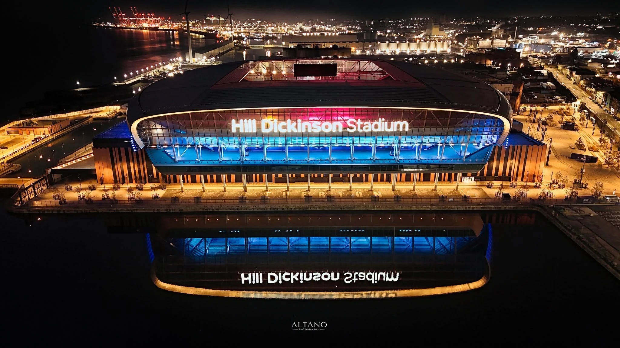 Aerial view looking across the roof and open bowl of Hill Dickinson Stadium