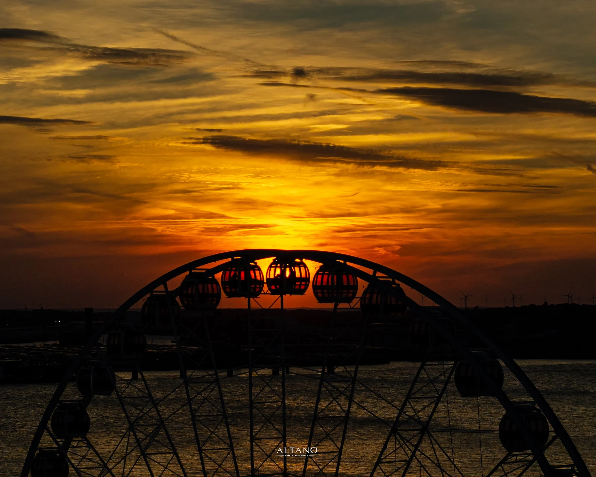 Sunset Through the Wheel, Liverpool waterfront at sunset