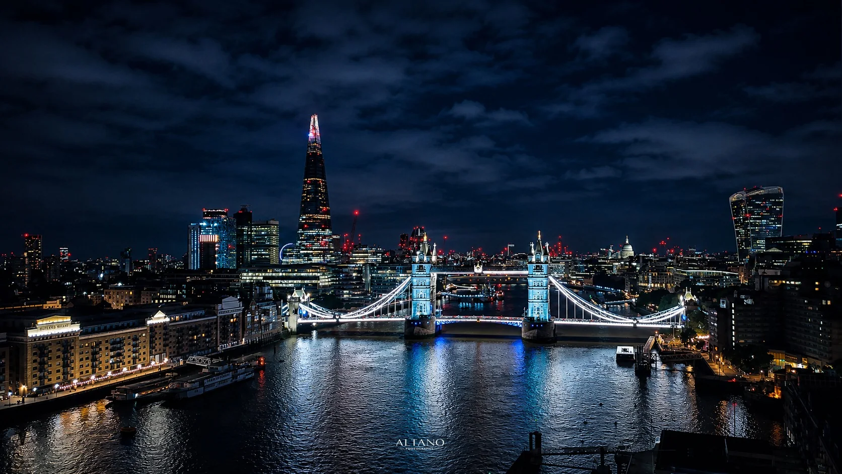 Tower Bridge and the London skyline, London at night